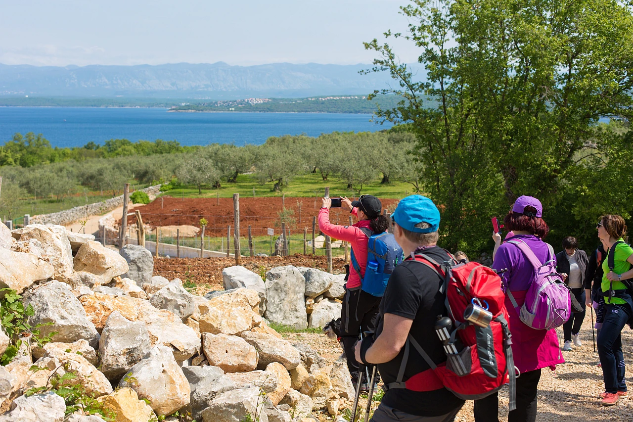 People hiking in Malinska